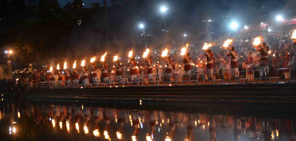 Attend Evening Ganga Aarti at Triveni Ghat